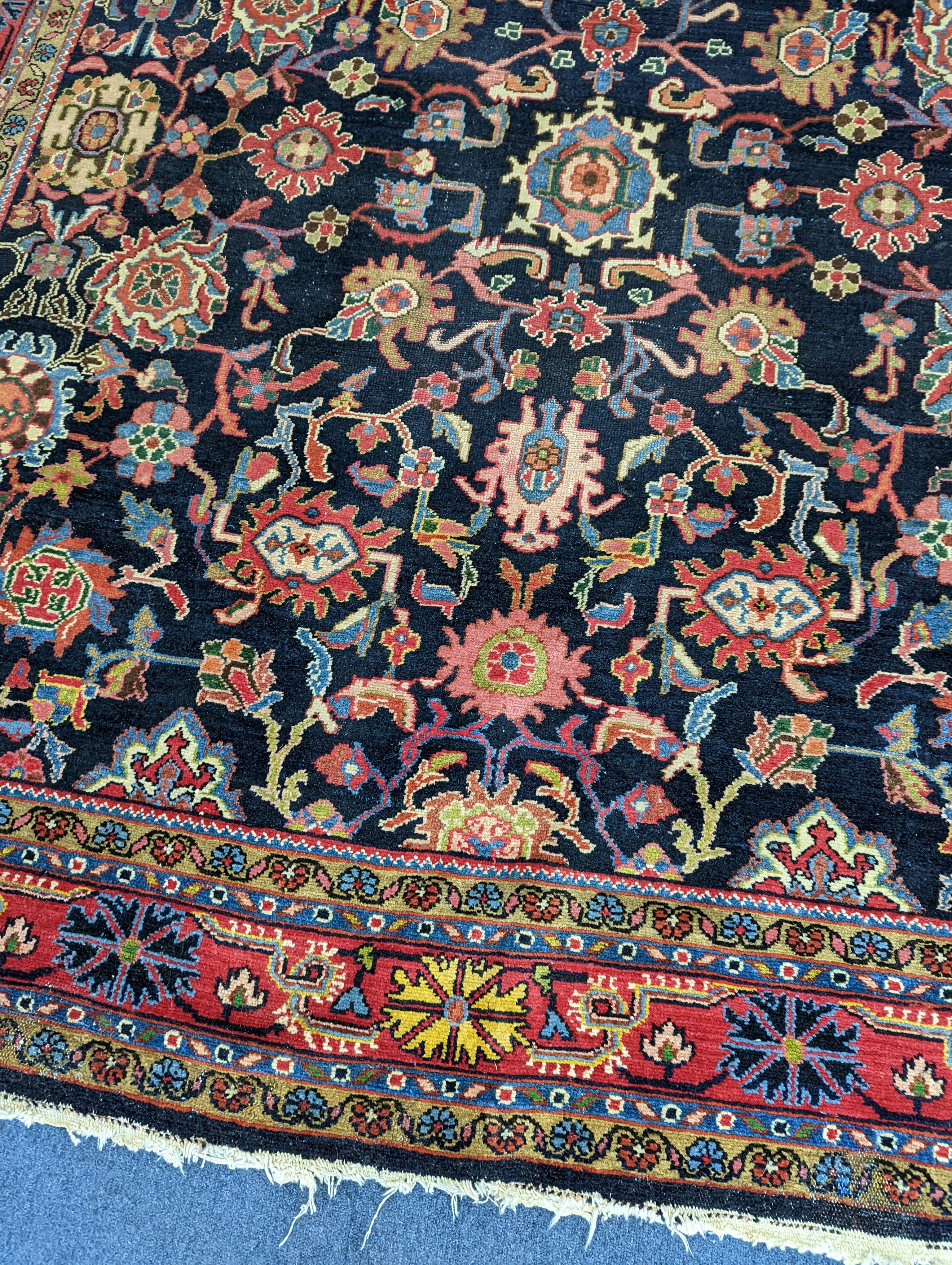 A Heriz / Moghal blue ground carpet, 340 x 206cm